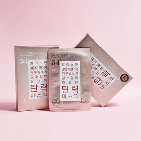 Two boxes and a packet of Dr.Gloderm Lift-up Facial Mask, over a pink background